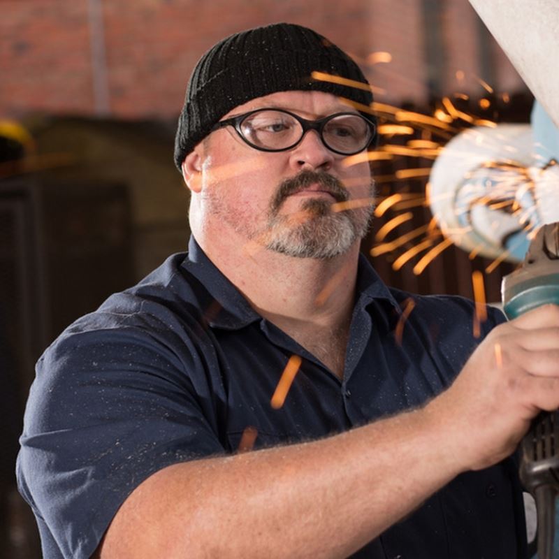 Adam Walls works on sculpture