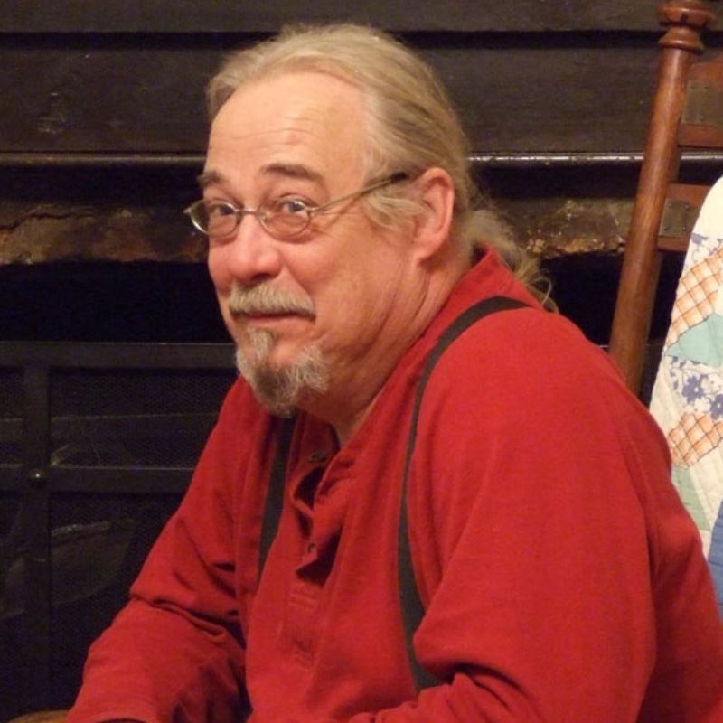 Beau Lyday sits in wooden chair